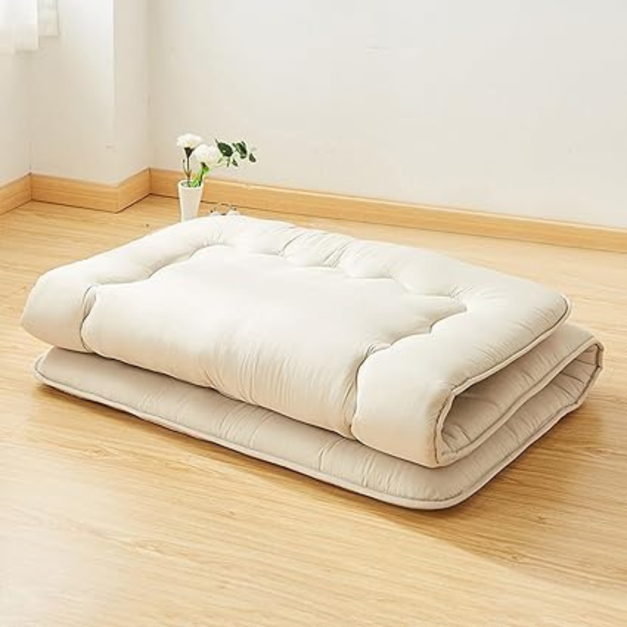Matelas futon pliable au sol – Confort minimaliste et gain de place